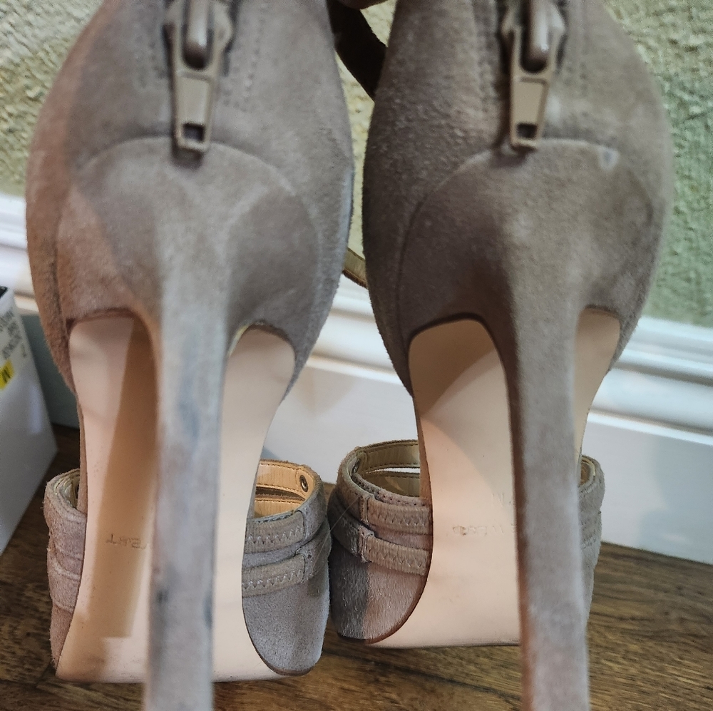 High heels.  Nude Nine West. Size 7
